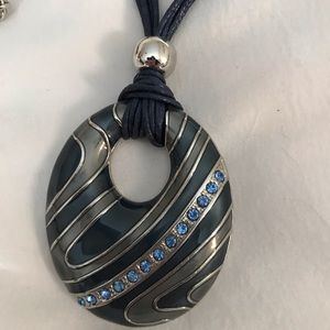 Blue and Gray Swirl Pendant on Blue Cords
